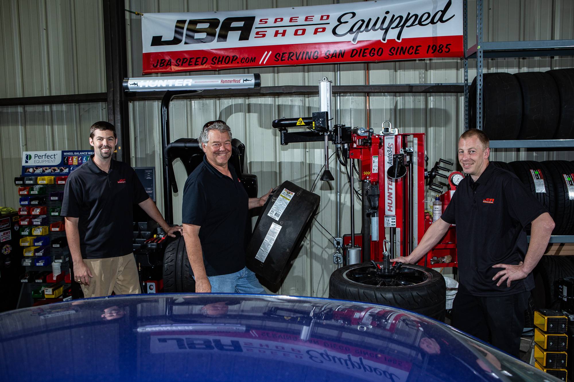 Meltdown Tires Team - Austin, J and Kyle with the Hunter Automated Mounting and Balancing system